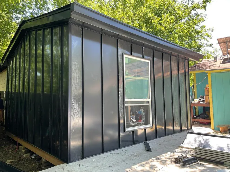 Black standing seam metal wall panels for Metal Roof Installation in Spring Creek